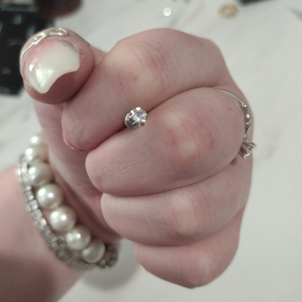 Single white stone earring
